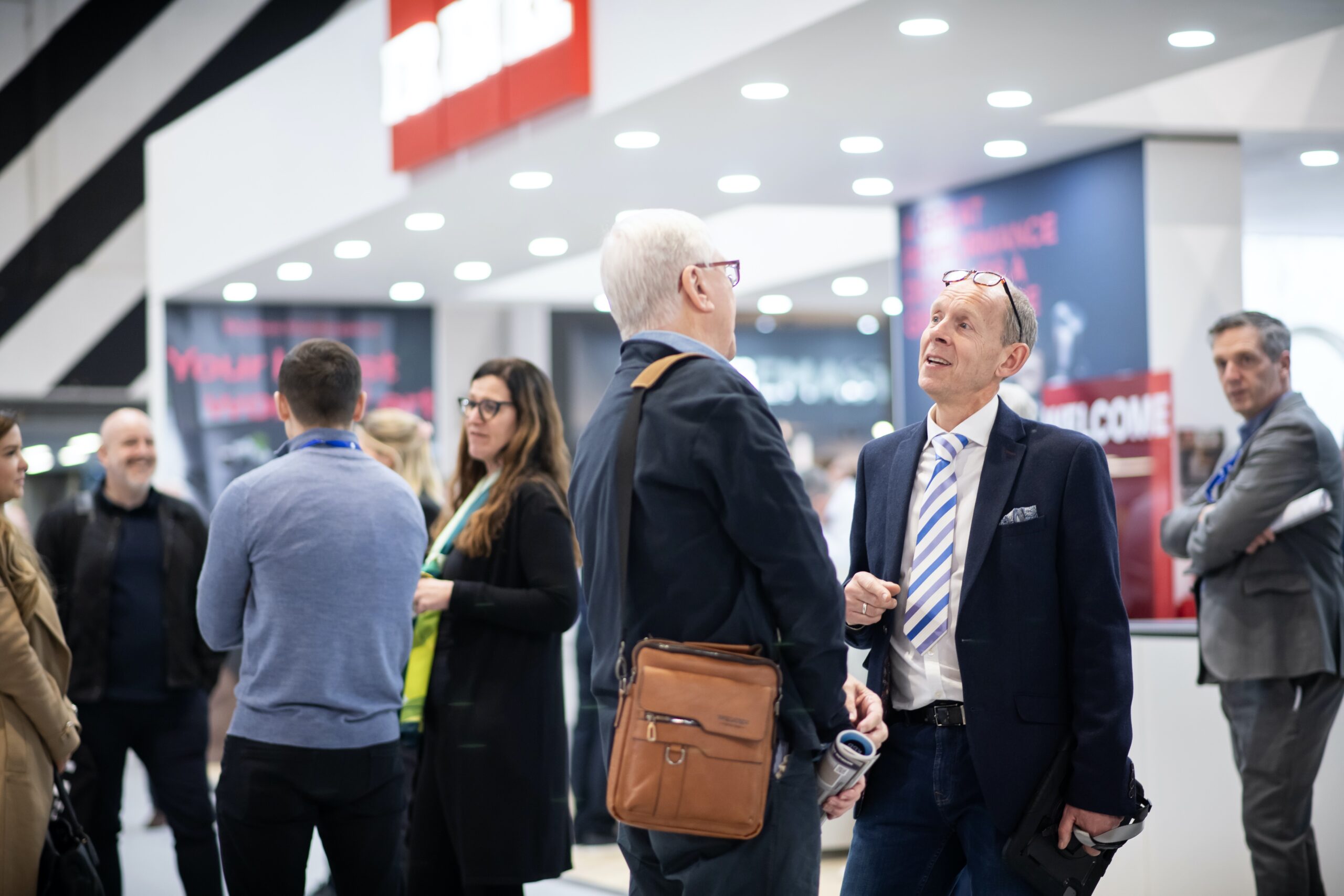 Jon Johnston talking with an attendee at kbb Birmingham 2024